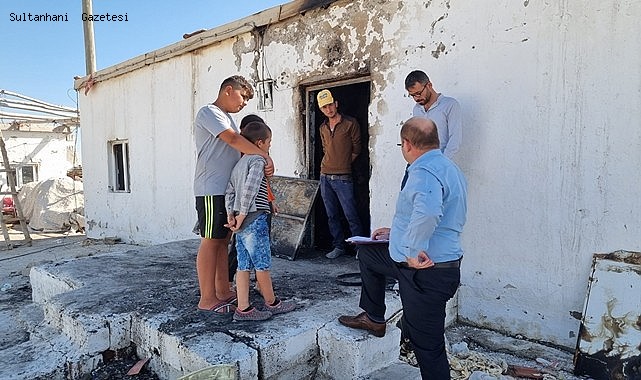 SULTANHANI İLÇESİNDE EVİ YANAN AİLEYE KAYMAKAMLIK VE BELEDİYE SAHİP ÇIKTI